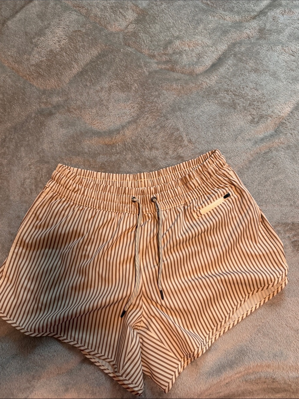 Vuori Striped Athletic Shorts in Cream & Brown